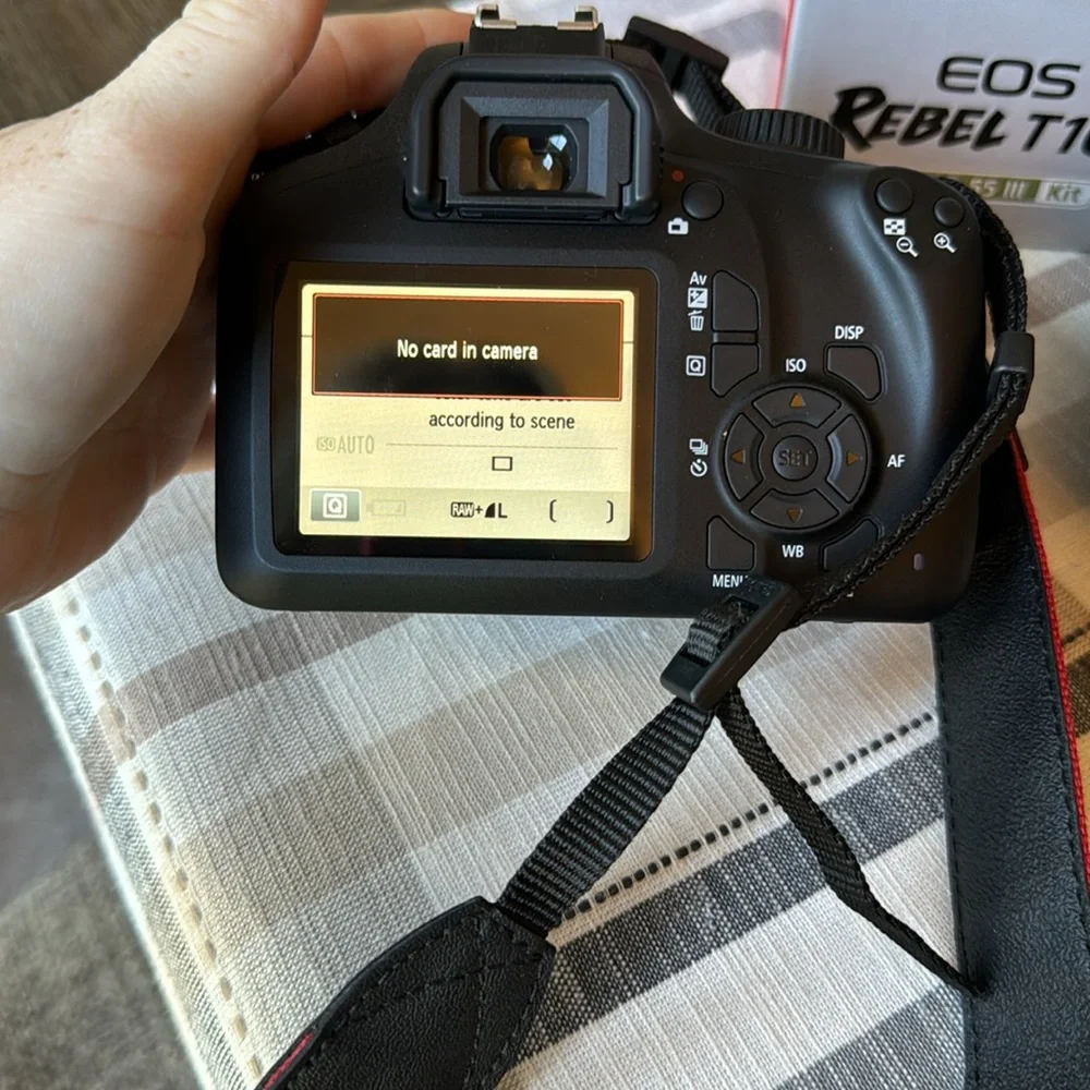 Canon EOS Rebel T100 Kit. BRAND NEW. NEVER USED.